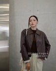 16a30 Leather jacket with Peter Pan collar and buttoned sleeves