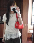 28A69- RUFFLE HEM TOP
