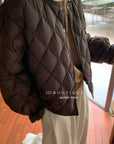 19a93 Fur-quilted puffer jacket