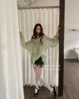 12a9 Sheer ruffle blouse – sage green or white