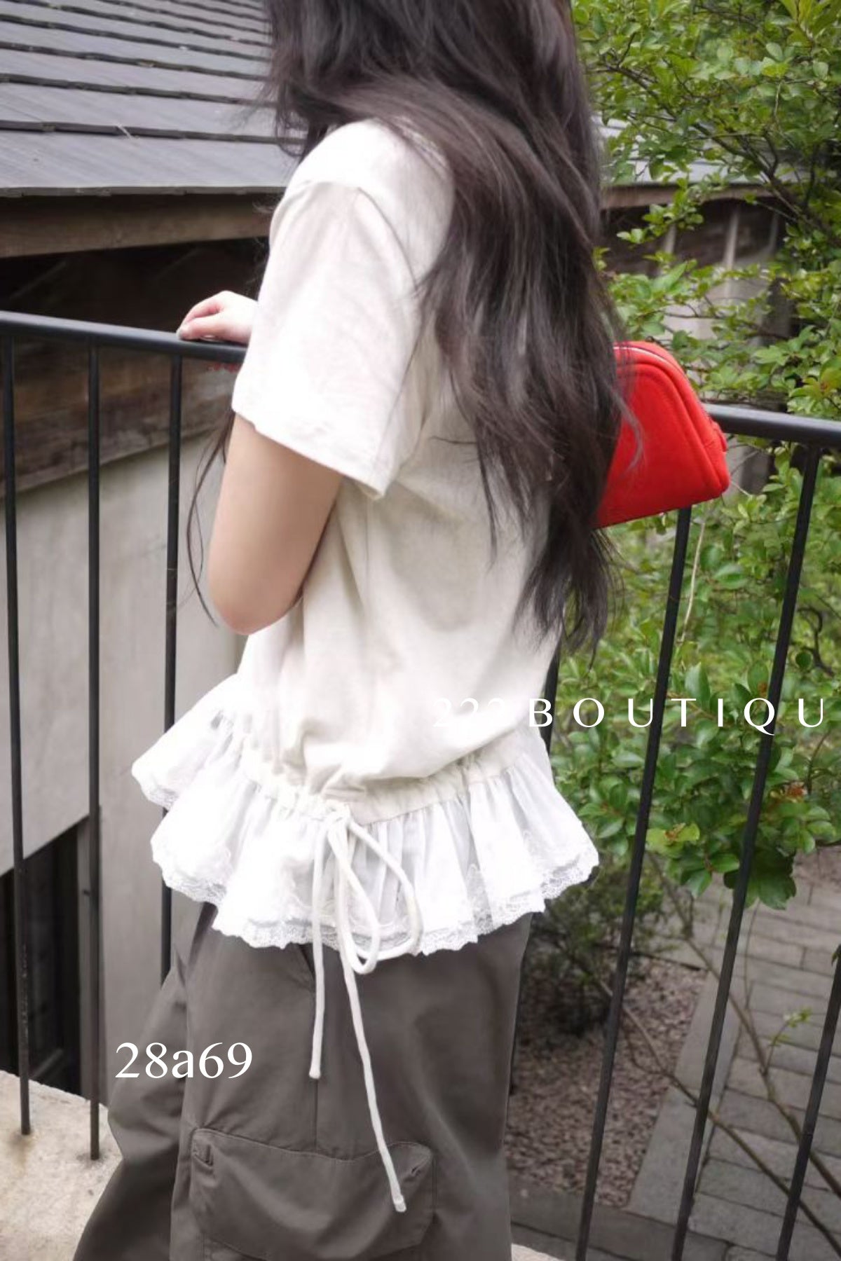 28A69- RUFFLE HEM TOP